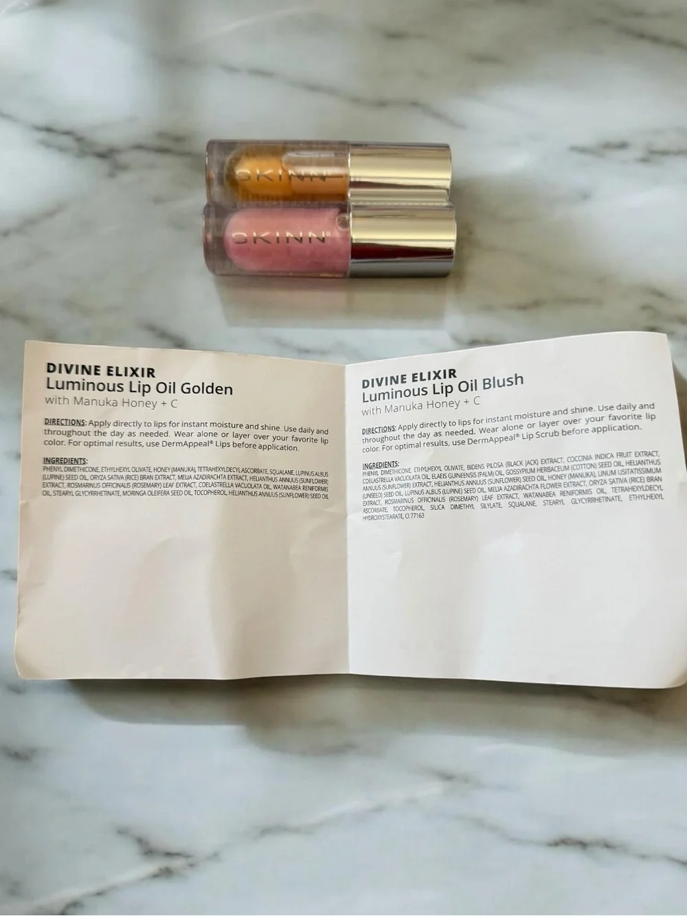 New and Sealed 2-SKINN Luminous Lip Oil in Golden and Blush